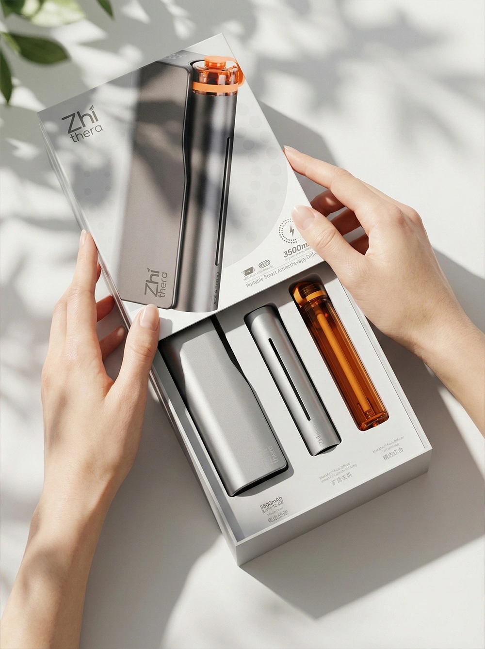 A gift set of a diffuser and essential oils