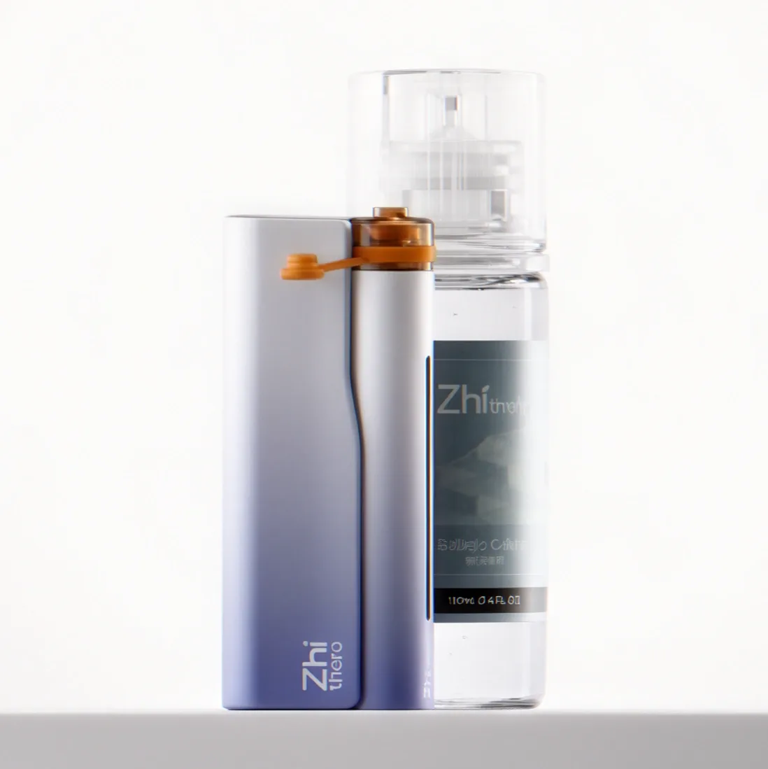 Zhithera D1 waterless nebulizing diffuser beside a 100 ml fragrance oil bottle on a white background