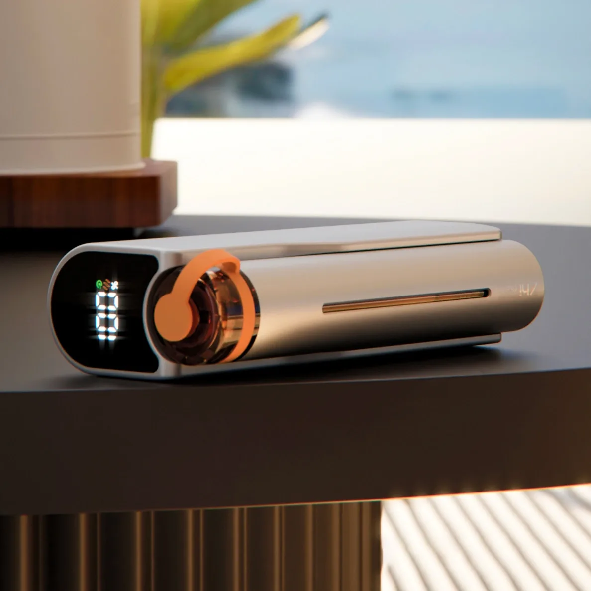 Zhithera D1 waterless diffuser lying on its side with LED display and orange cartridge cap