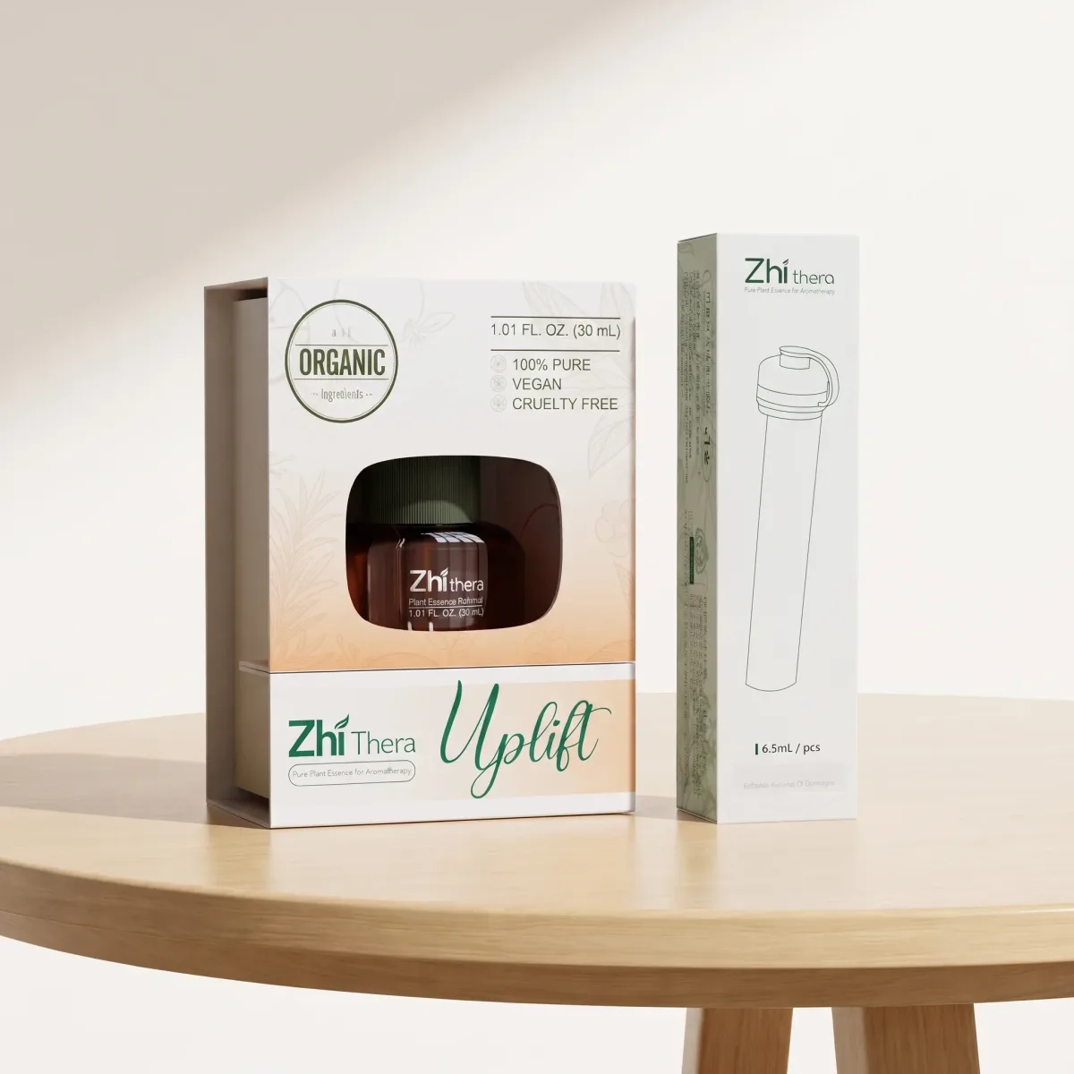 Zhithera refillable cartridge box next to a boxed 10 ml essential oil labeled "Uplift"